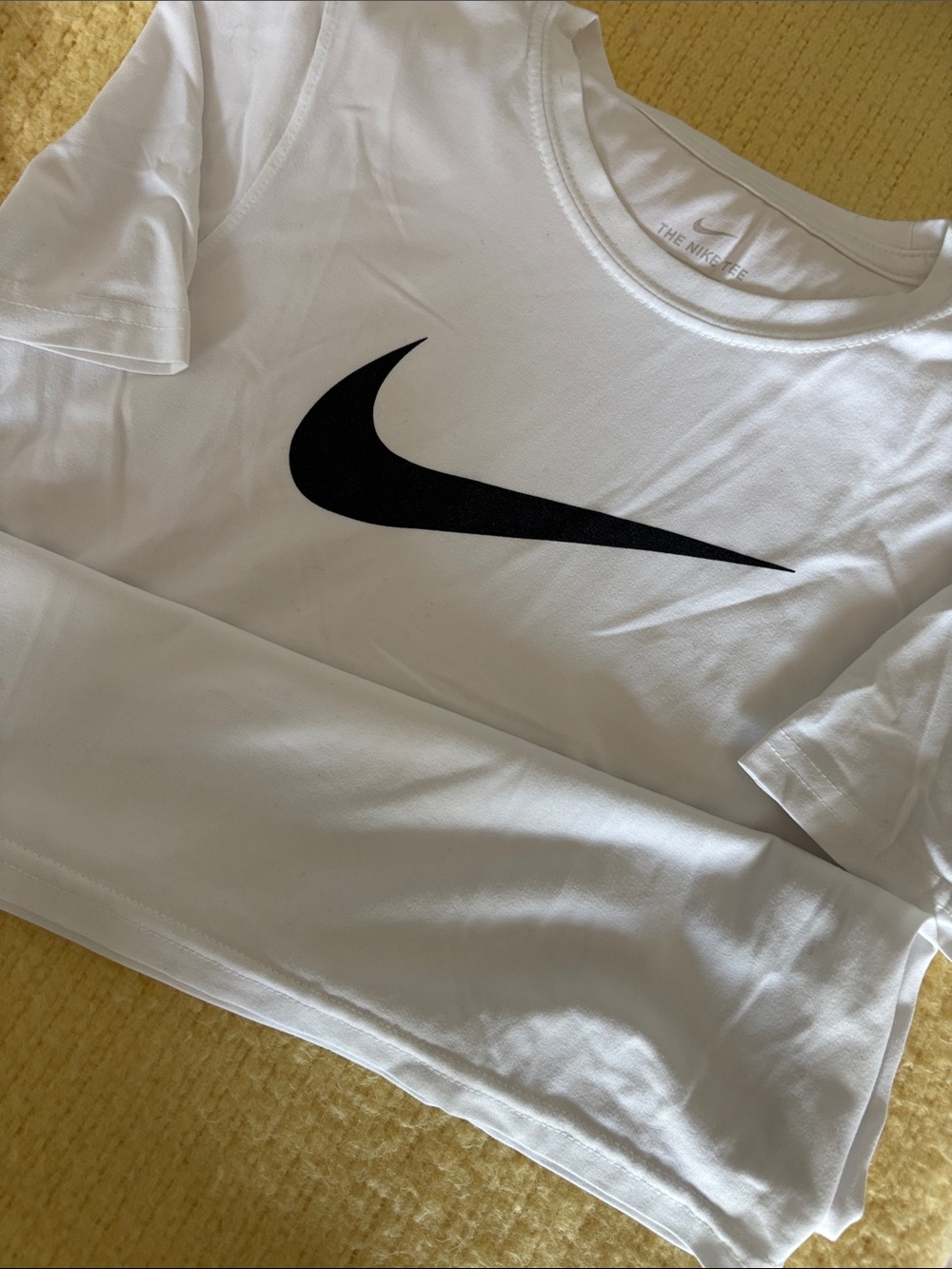 Nike White T-Shirt with Black Swoosh Logo